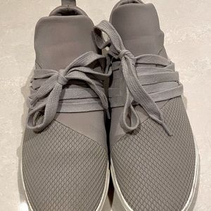 Gray woman’s running shoes